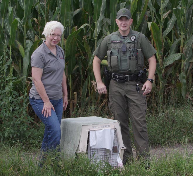 Robyn Graboski and State Game Warden Michael College