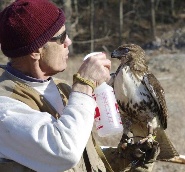 Karl giving Zoey a drink